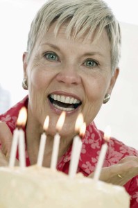 Excited Woman with a Cake